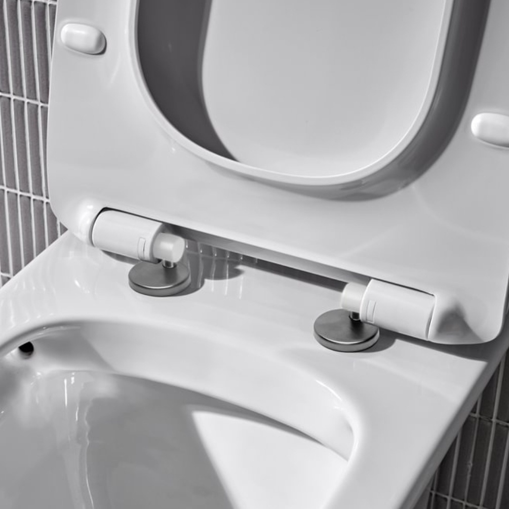Lifestyle image of the Tavistock Loft Gunmetal Wrap Over Toilet Seat Hinge Cover Caps